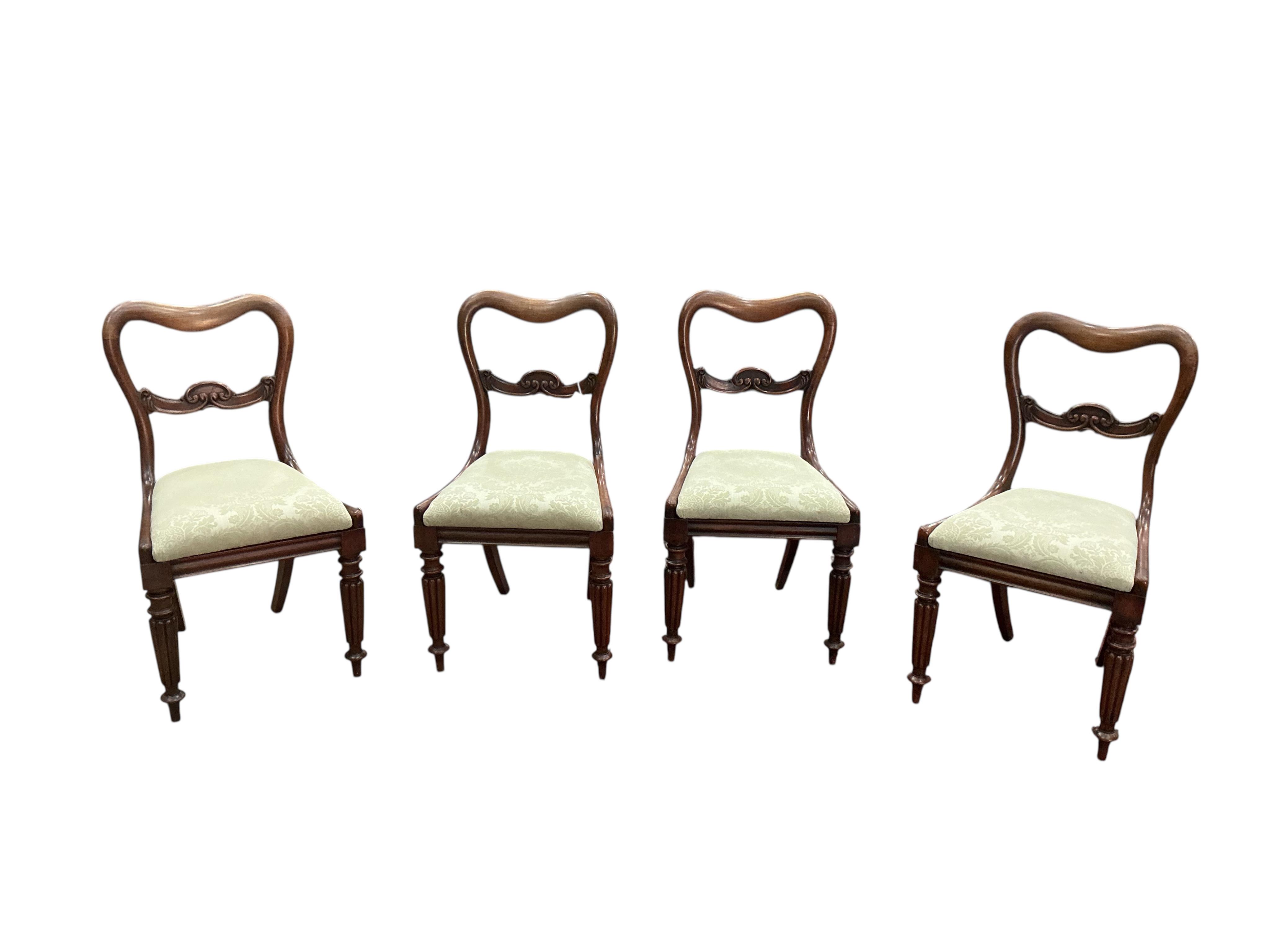 A set of six early Victorian rosewood dining chairs